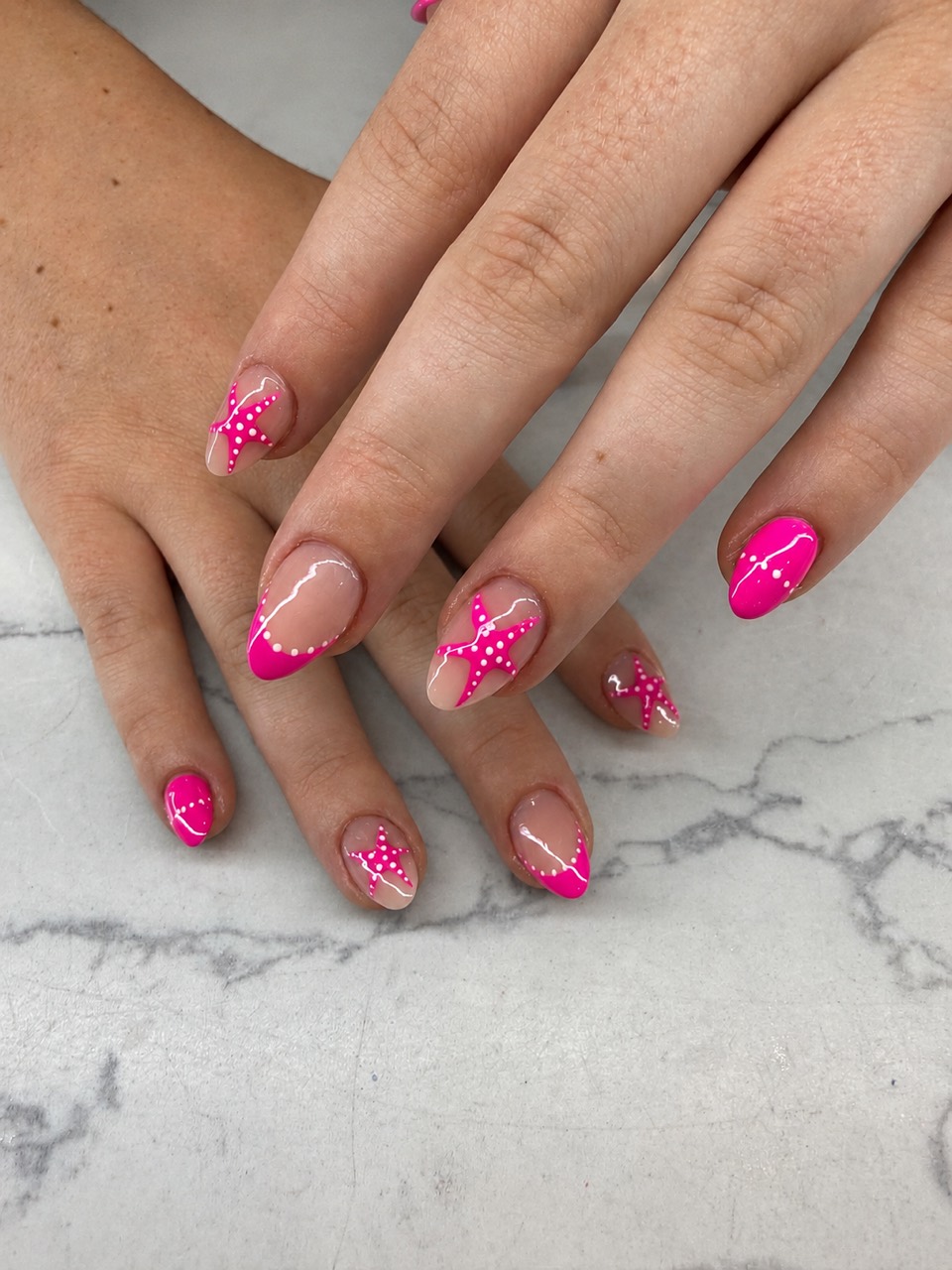 Pink starfish nail art